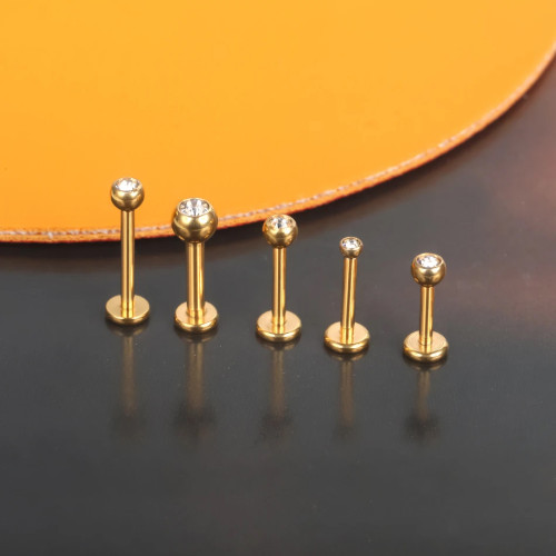 Интернал-лабрета 1,2 мм, накрутка 2 мм с кристаллом. Титан, золотое анодирование. LBICT2J16G