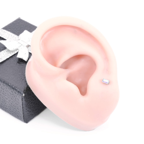 Интернал-лабрета 1,2 мм. Прямоугольный кристалл AB, золотое анодирование. Титан. ILBT5690