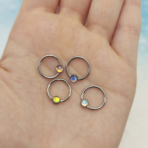 Кольцо 1,2 мм. Титан. Вставка с кристаллом Magic. BCRTMB16