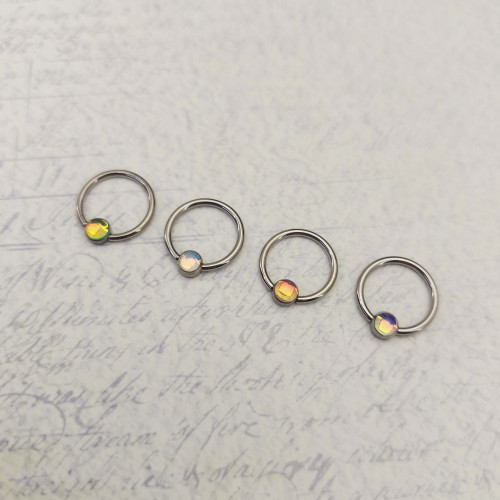 Кольцо 1,2 мм. Титан. Вставка с кристаллом Magic. BCRTMB16