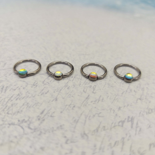 Кольцо 1,2 мм. Титан. Вставка с кристаллом Magic. BCRTMB16